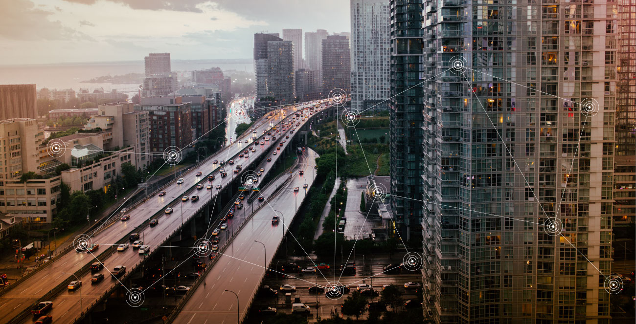 Image of a city scape depicting how Marketsupport bridges the gap connecting consumer to brand to manufacturer to retailer through its merchandising services.